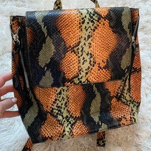 Snake skin print backpack